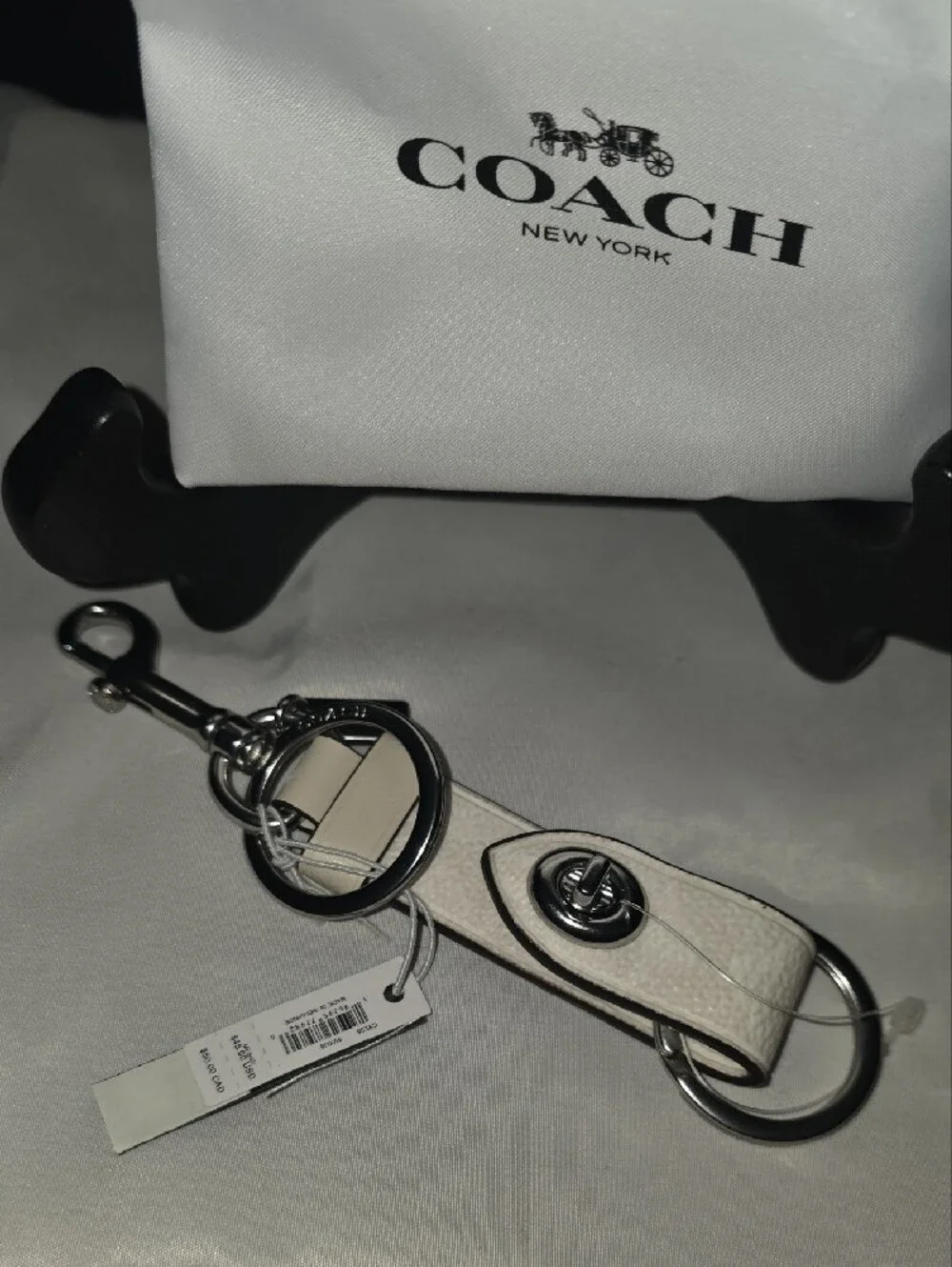 Coach Silver Leather Turn-Lock Keychain